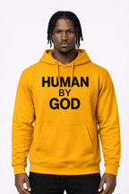Protected in Plain Sight — Front view model wearing HUMAN BY GOD gold hoodie