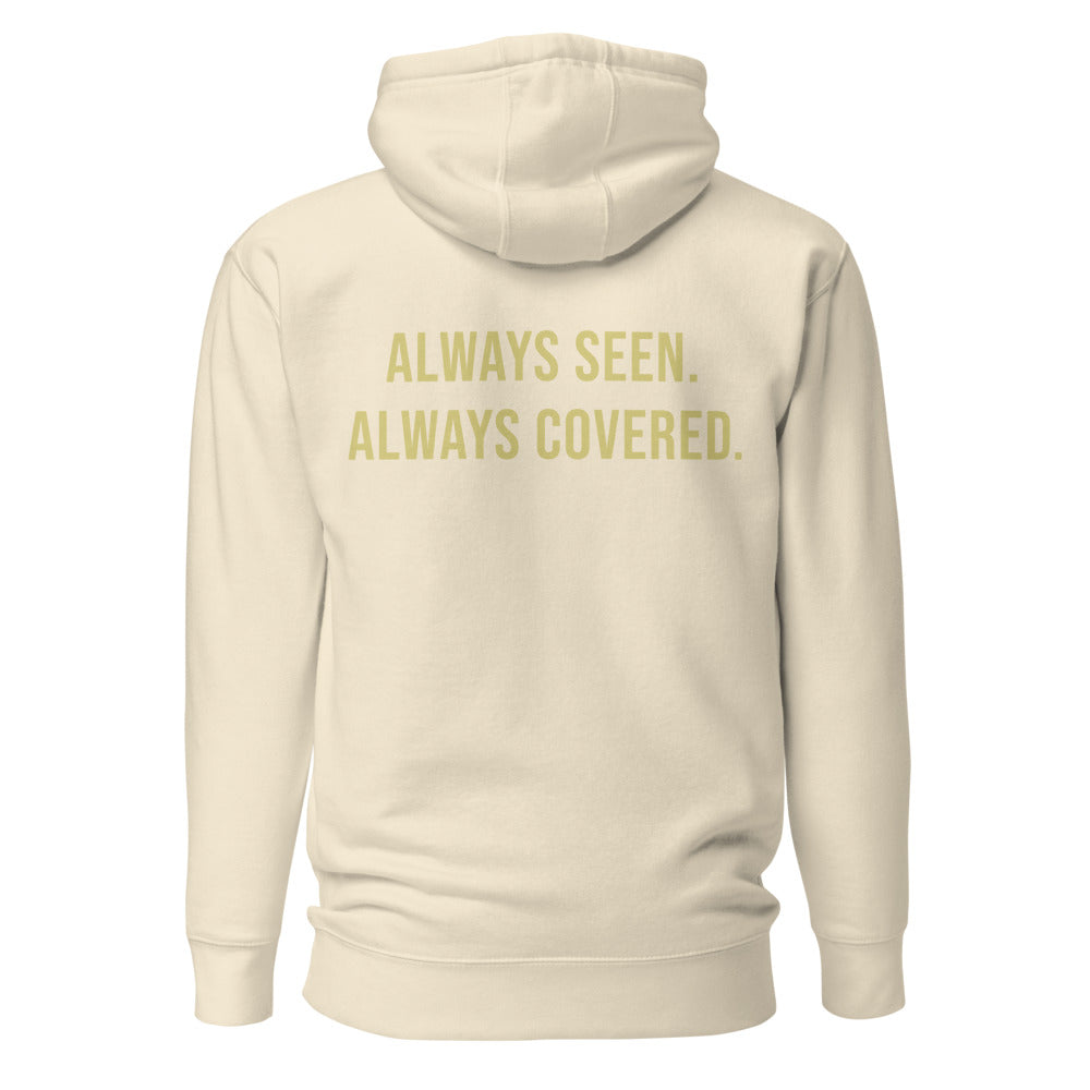 Always Seen Always Covered — Bone hoodie back with Butter ink slogan