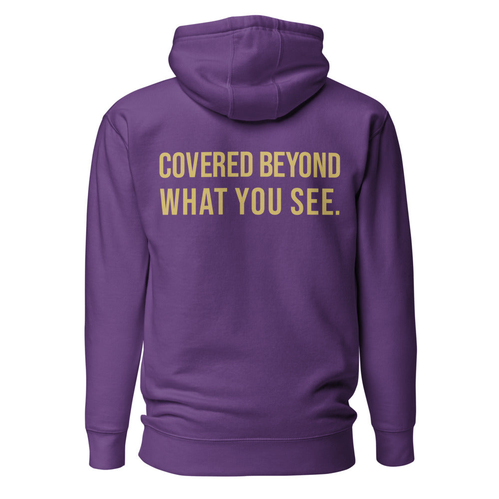 Covered Beyond What You See — Purple hoodie back with Gold ink slogan