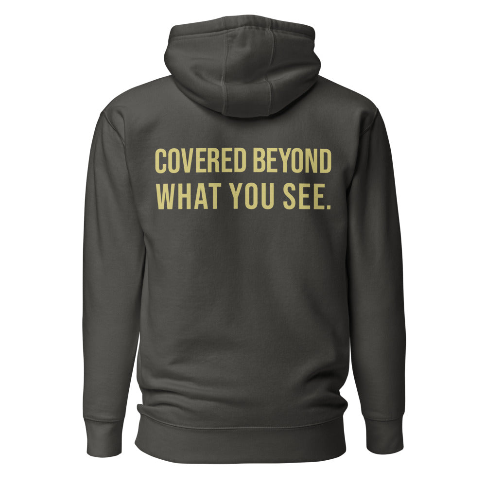 Covered Beyond What You See — Embroidered Faith Hoodie — Vintage Black hoodie back with Butter ink slogan