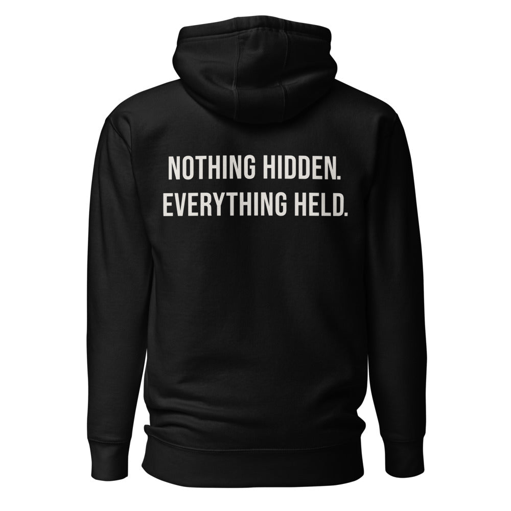 Nothing Hidden. Everything Held. — Black hoodie — back view