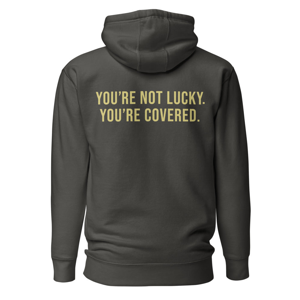 You're Not Lucky. You're Covered. — Premium Faith Hoodie — Vintage Black hoodie back with Butter ink slogan